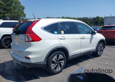 2015 Honda Cr-V Touring z USA, uszkodzony, nr VIN 5J6RM4H92FL116338